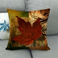 Macro shot of maple leaf oil painting pattern on a textured linen autumn cushion cover - Vintage Oil Painting Red Maple Style