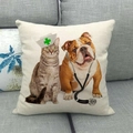 Detail of linen cat and bulldog nurse pillow cover on a modern gray fabric sofa - Pet Doctor Cat and Dog Style