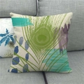 Artistic watercolor peacock feather pattern on linen cushion cover placed on sofa - Abstract Brushstroke Cyan Purple Peacock Feather (14)