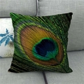 Detail shot of the peacock feather pattern on a linen throw pillowcase for sofa decor - High Definition Metallic Feather Style 10 (10)