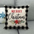 Close-up of Merry Christmas linen pillowcase with buffalo check border on a grey sofa - Poinsettia Floral Style (7) / 45x45cm