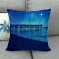 Linen pillowcase with starry night and sea bridge landscape on a grey fabric sofa - Starry Sky Moonlight Seashore Pier Style (2)