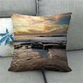 Detailed texture of linen throw pillow case featuring sunset beach scenery on a gray sofa - Sunset Rocky Coast Style (3)