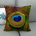Linen pillowcase with realistic heart-shaped peacock feather eye print on grey sofa - Heart Shaped Eye Style 23 (23)