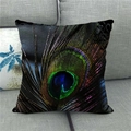 Linen decorative pillowcase featuring a vibrant peacock feather pattern on a gray sofa - Rose Purple High Impact Style 24 (24)