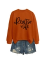 Detail of rust red Realtor life sweatshirt paired with distressed blue denim shorts - Burnt Orange (Black Font)