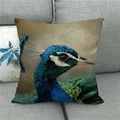 Detail of linen pillowcase with realistic peacock head print on a grey sofa - Realistic HD Digital Print Peacock