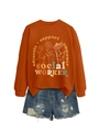 Detail of caramel floral sweatshirt with advocate support empower text and denim shorts - S / Burnt Orange