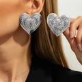 Retro oversized silver heart earrings with embossed floral design and bohemian style finish - Antique Silver