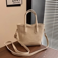 Schicke beige Leder-Beuteltasche für Damen mit zwei Griffen und langem Umhängeriemen - Gebrochenes Weiß