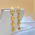 Elegant 18K gold plated teardrop tassel earrings with four segments on white silk - Gold