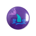 Close-up of a glossy mermaid tail theme tinplate badge for birthday party favors - Purple Mermaid Tail Style (1)
