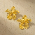 Detail showing 18K gold plated orchid stud earrings with realistic petal textures - Gold
