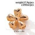 Golden flower hair claw clip in polished alloy weighing 57.9g and 8.5cm wide - Large / Gold