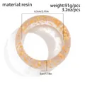 Macro view of geometric resin bangle with gold foil flakes and 91g weight spec - Transparent Gold Foil Resin Style (TM2594)