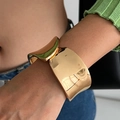 Polished chunky gold concave bangle featuring irregular punk style wavy metal design - Concave Wave Style (02669-Gold)