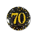 Close-up of 58mm black and gold birthday badge featuring sparkling number 70 and dots - 70th Birthday Style