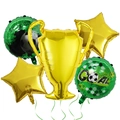 Detail view of World Cup football party balloons set with golden trophy and star shapes - Soccer Trophy Set D