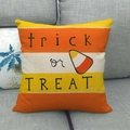 Close-up of Happy Fall linen pillowcase with trick or treat text and candy corn design - Halloween Trick or Treat Style (6)