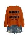 Detailed view of an orange sweatshirt with black graphic text print and denim shorts - Burnt Orange (Black Font)