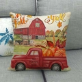 Gros plan d'une taie d'oreiller en lin avec citrouilles et camion sur un canapé gris - 45x45cm / Style de Camion Rouge Campagne (11)