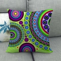 Colorful geometric mandala linen pillowcase displayed on a modern grey fabric sofa - Colorful Modern Dotted Mandala Pattern (6)