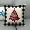 Dettaglio federa natalizia in lino con albero scozzese e scritta Merry Christmas su divano - Albero a Quadri Lavato Vintage (Stile 4)