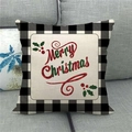 Detail of Merry Christmas linen pillowcase with buffalo plaid borders on a gray sofa - Holly Berry Merry Christmas Pattern (9) / 45x45cm