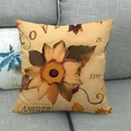 Close-up of linen maple leaf pillowcase featuring Is The Answer text on a sofa - Retro Artistic Floral (14) / 45x45cm