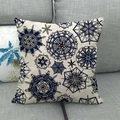 Close-up of geometric mandala pattern on textured linen throw pillow cover on grey sofa - Blue and Black Geometric (7) / 45x45cm
