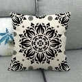Detailed view of linen cushion cover featuring black mandala pattern on a beige fabric - Retro Black Flower on Beige (10) / 45x45cm