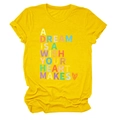 Detail of yellow cotton t-shirt with multicolored A Dream Is A Wish Your Heart Makes print - Yellow