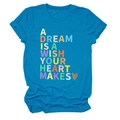 Detail of blue T-shirt featuring A Dream Is A Wish Your Heart Makes quote and orange heart - Lake Blue