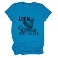 Detailed flat lay of a blue crewneck T-shirt featuring vintage Local Egg Dealer print - Lake Blue