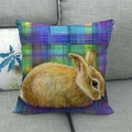 Detailed texture of Easter linen pillowcase with colorful plaid and rabbit on a grey sofa - Yellow Brown Rabbit Color Plaid Style (3)