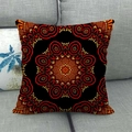 Detailed view of square bohemian pillow with red and black mandala patterns on sofa - Red Black Orange Mandala Texture (9)