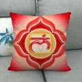 Detail of red Bohemian linen pillow with chakra pattern on a gray fabric sofa - Red Root Chakra Lotus (11)