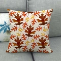 Detail of fall maple leaf print on textured cotton linen pillowcase over a grey sofa - Red-Orange-Yellow Gradient Maple Style (15)