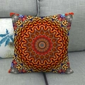 Close-up of geometric mandala pattern on square linen pillow cover over grey sofa - Orange Blue Exotic Mandala (15)