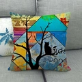Artistic watercolor cat and bird linen pillowcase on a modern sofa detail view - 45x45cm / Multicolor Geometric Cat Under Tree (5)