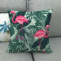 Detail of flamingo linen pillowcase with tropical leaf pattern on a grey fabric sofa - Pink Green Contrast Flamingo Leaves (14)