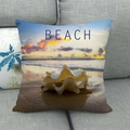 Linen pillowcase with beach sunset print and white seashell on a gray sofa - 45x45cm / Sunset Beach Style (2)