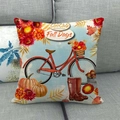 Dettaglio della federa in lino con bicicletta vintage rossa e motivo di zucca autunnale - Bici Rossa Vintage e Zucche (2)