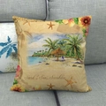 Linen pillowcase with tropical beach scene and Sand Sea Sunshine text on a gray sofa - Beach Sand Sea Sunshine (10)