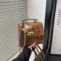 Brown faux suede backpack with cute bear pendant and decorative metal buckle straps - Brown (With Charm)