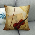 Vintage linen pillowcase with violin and sheet music print on a gray fabric sofa - Classical Violin Style (3) / 45x45cm