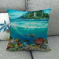 Detail of mermaid ocean linen pillowcase showing dolphins and coral on a grey sofa - Dolphin Coral Landscape Style (6)