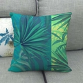 Detailed view of linen pillowcase with tropical palm and monstera leaf print on sofa - 18x18 Inch / Lush Interwoven Palm Leaves (14)