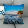 Linen beach scenery pillow cover with blue ocean wave print on a gray sofa cushion - Seaside Scenery (1) / 45x45cm
