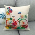 Watercolor cartoon bicycle with balloons on linen throw pillow cover on a grey sofa - 18x18 Inch / Watercolor Bicycle with Colored Balloons (9)